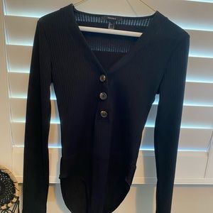 black bodysuit with buttons in front
